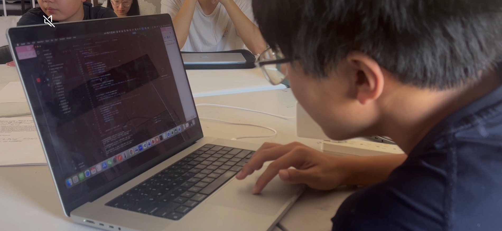 Student editing code during Snake-Lab camp